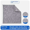 Silver coloured square microfiber scourer pad for cleaning kitchen pots and bowls.