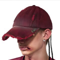 Rose red cotton peak cap with adjustable strap and spray design detail