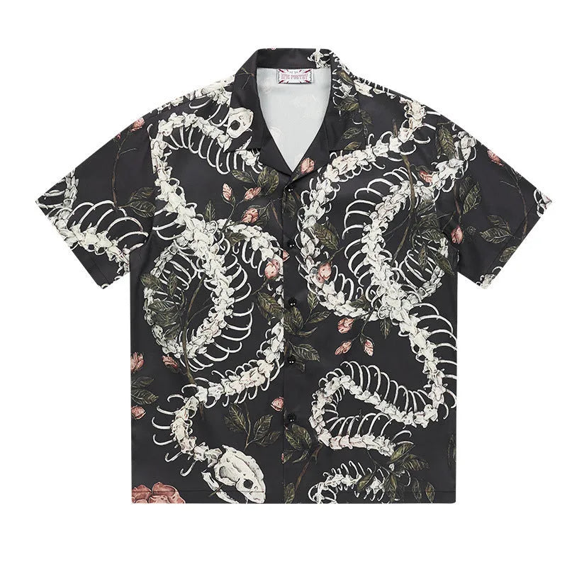 Short sleeve Cuban collar shirt with a snake bone and floral printed pattern in a loose fit.