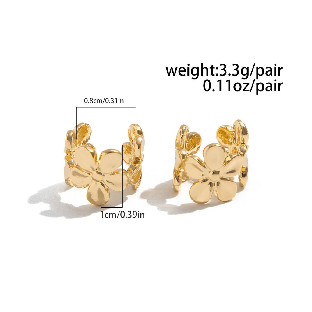Gold starfish and conch alloy drop hoop earrings for women.