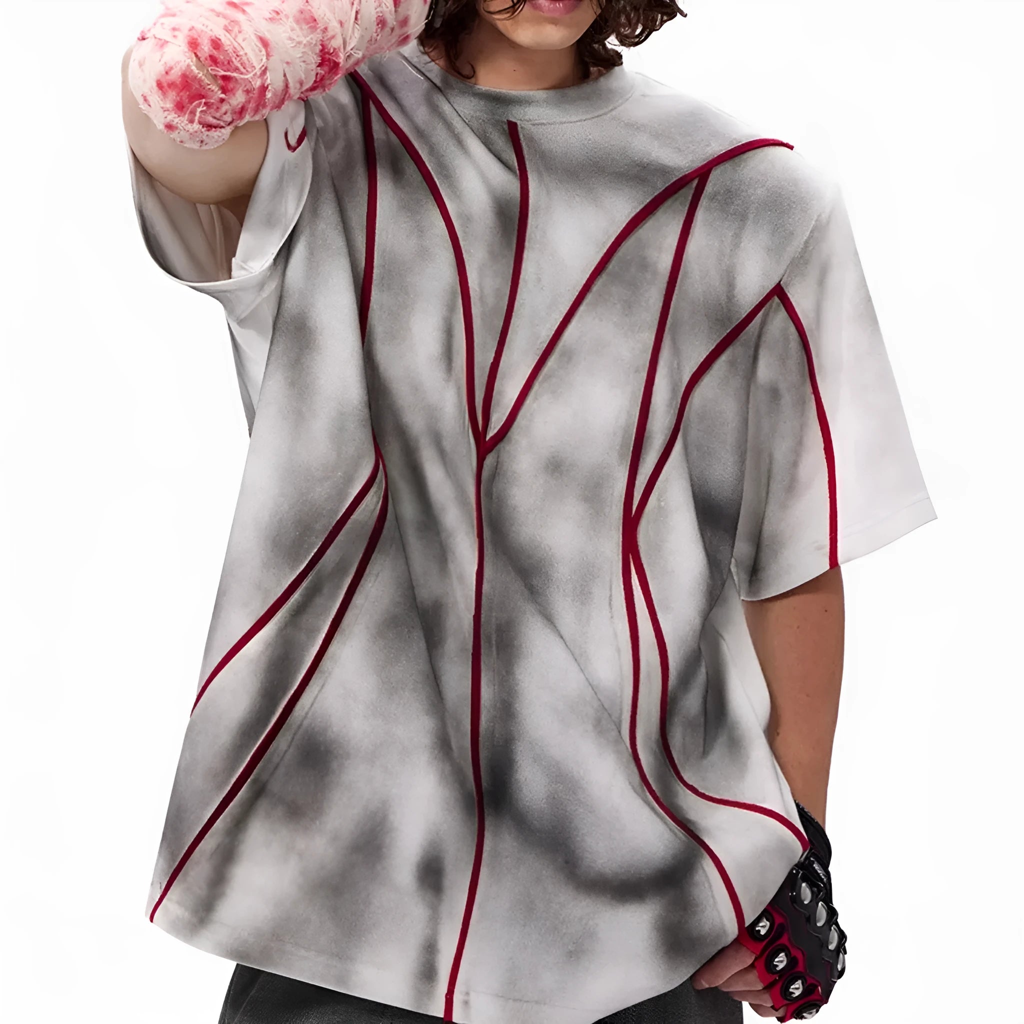 Women's short sleeve t-shirt with padded shoulders and three-dimensional line patchwork design on a round neck.