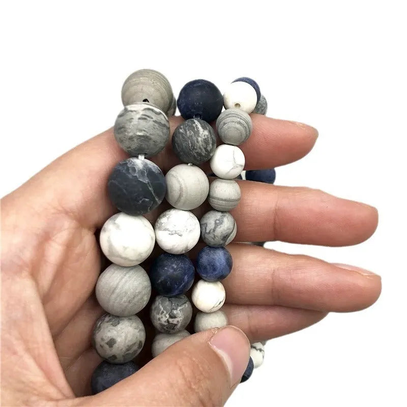 Handmade planet stone men's bracelet with U-shaped adjustable design showing natural stone beads