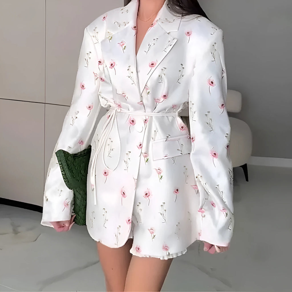 Printed collar suit jacket with lace-up front detail in apricot, shown on a hanger.