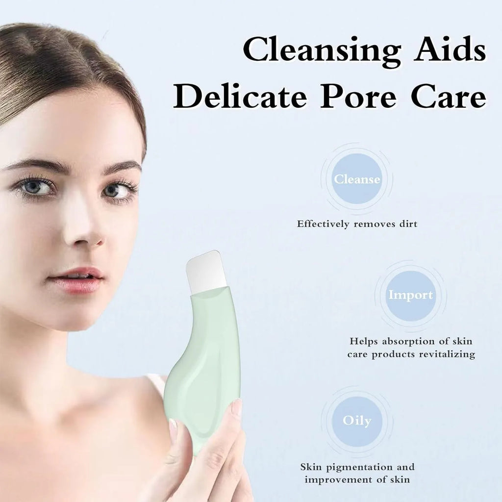 Stainless steel blackhead removal tool with green silicone attachment and non-slip handle