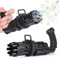 Children's ABS plastic bubble gun machine in pink with trigger and bubble head, used as a toy for outdoor parties