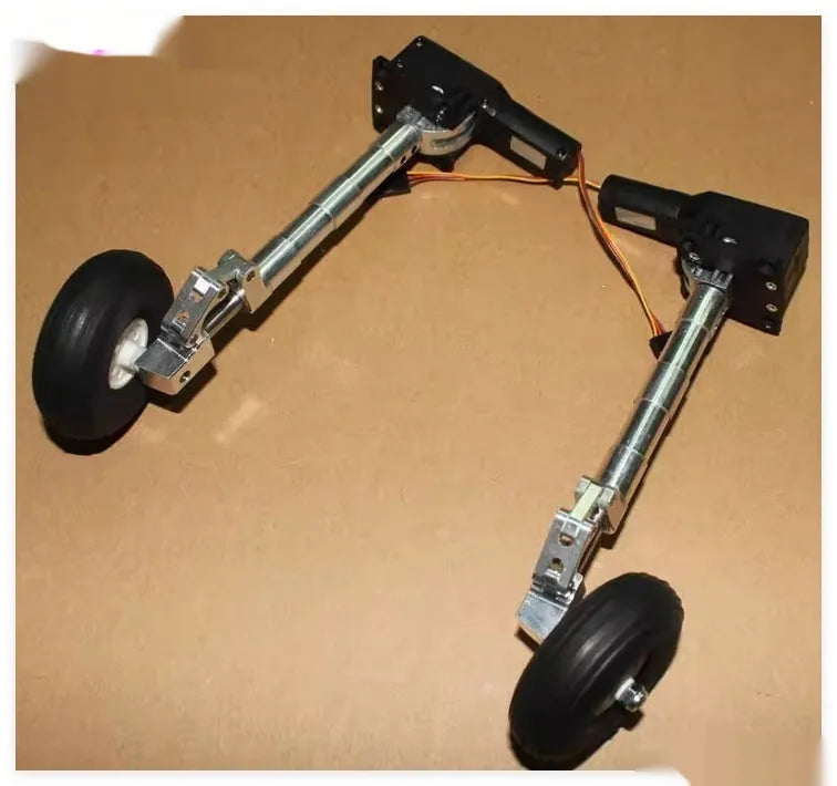 Alloy retractable shock-absorbing landing gear for RC aircraft with large wheels.