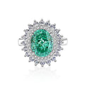 Women's S925 silver ring with emerald stone and high-carbon diamond inlays in geometric ellipse design