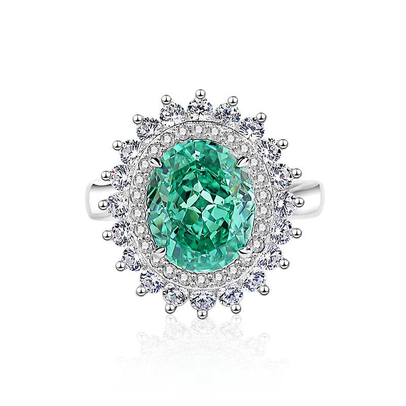 Women's S925 silver ring with emerald stone and high-carbon diamond inlays in geometric ellipse design