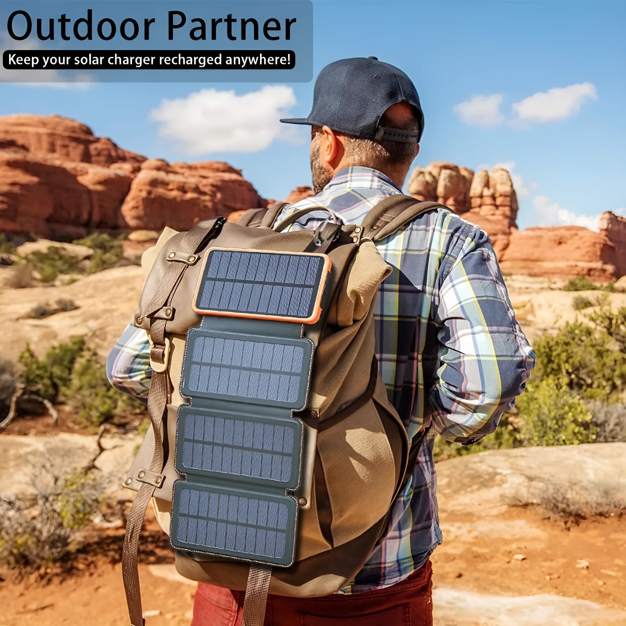 A black outdoor solar power bank with a solar panel, LED light, and soft leather finish, shown with a charging cable.