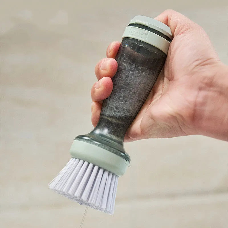 Milk white and mint green dish brush with soap dispenser in handle and non-scratch bristles