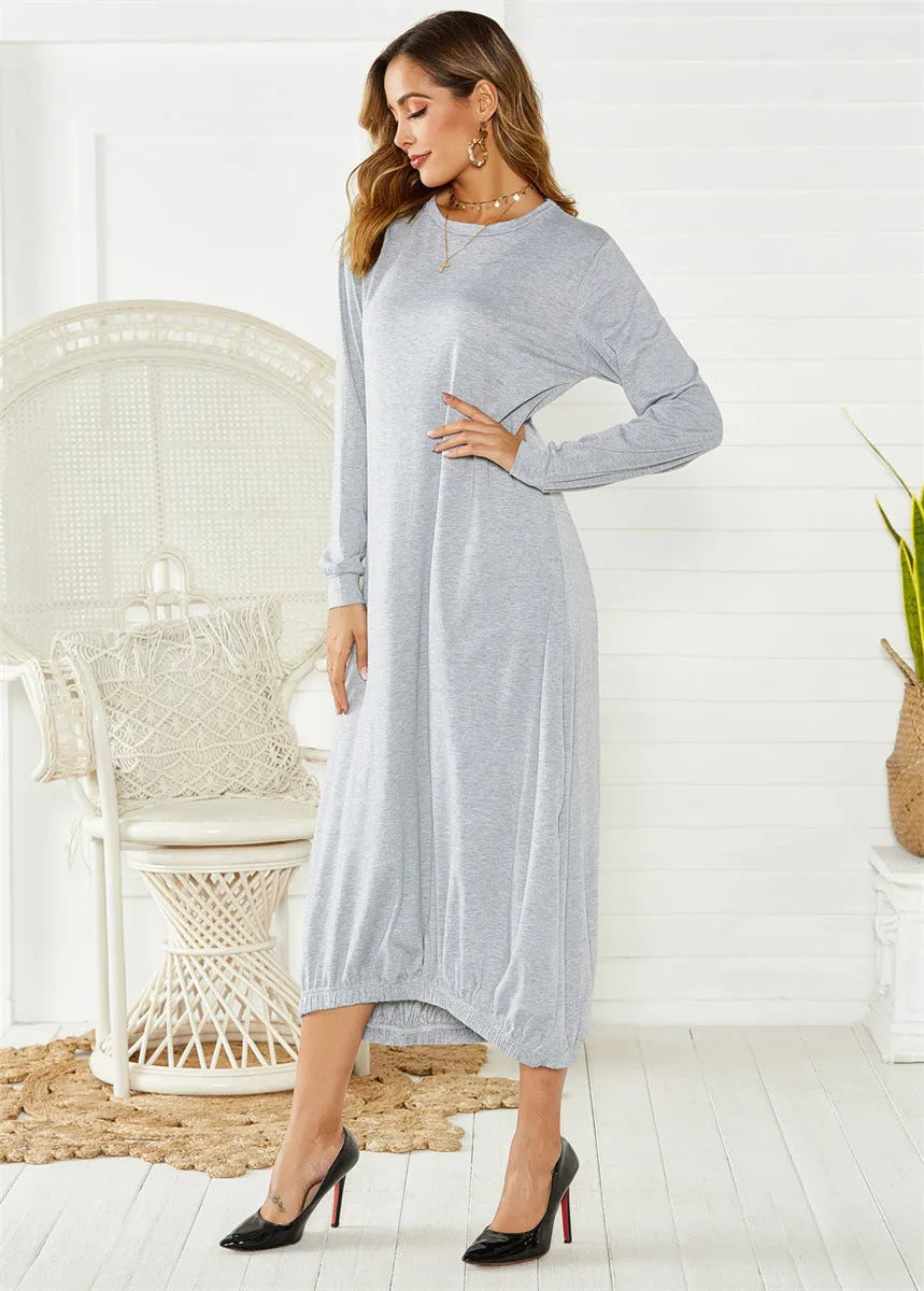 Black loose lantern dress with lace-up crew neck detail, shown on a hanger.