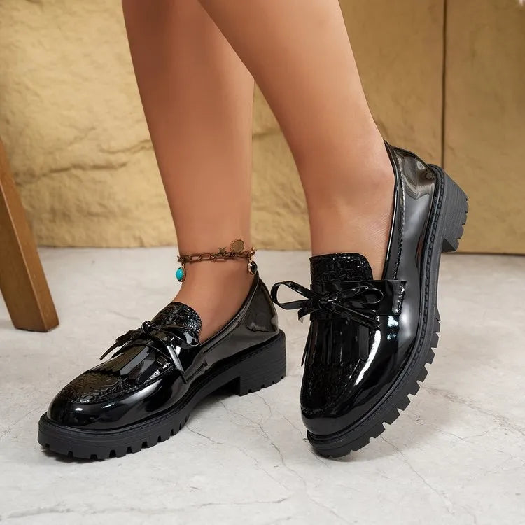 Women's brown loafers with decorative bow on artificial PU upper, shown in UK size 39
