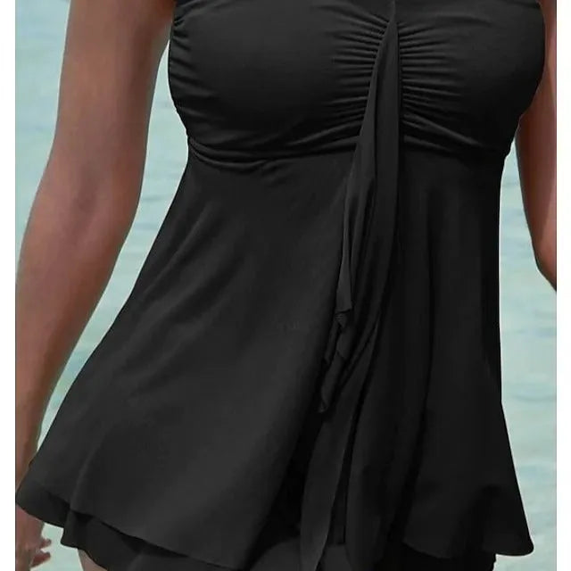 Women's strapless one-piece swimsuit in solid colour polyester fabric on mannequin