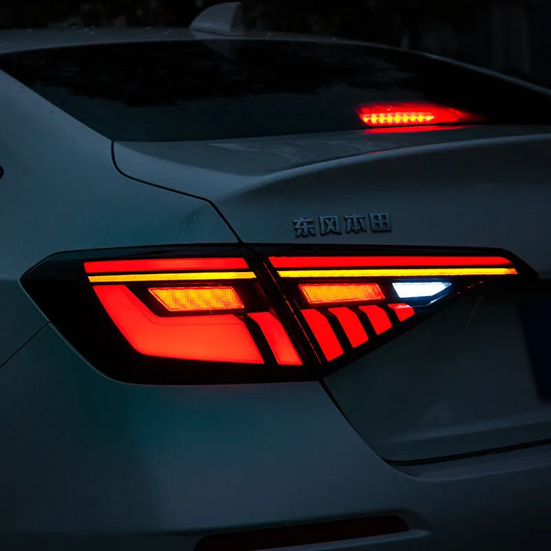 11th Generation Honda Civic black and red modified LED taillight assembly with dynamic streamer indicators