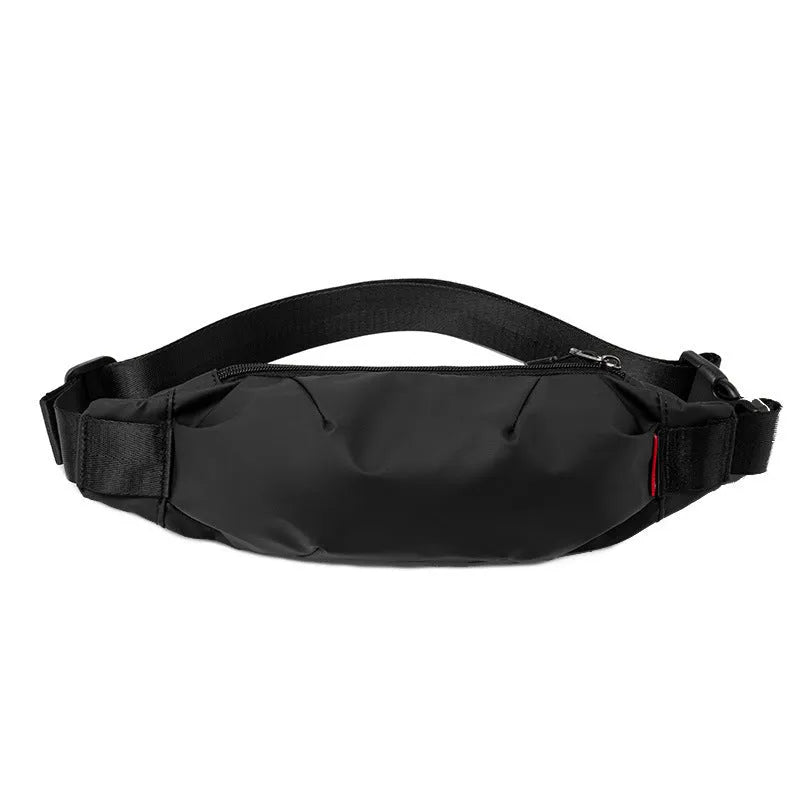 Black oxford cloth crossbody waist pack showing front zipper and strap.