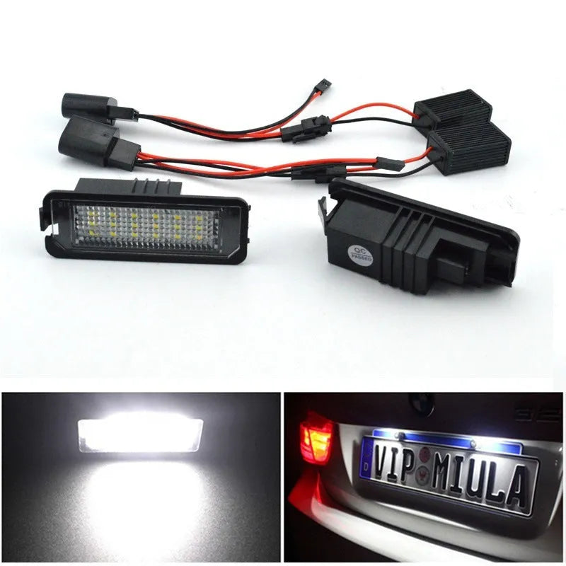 Pair of white LED license plate light bulbs for Volkswagen Golf, Polo, and Phaeton models.