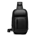 Black medium-sized PVC outdoor shoulder bag with an air cushion strap and internal organiser pockets.