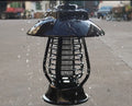 White solar powered mosquito lamp with solar panel and purple/white light switch for outdoor garden insect control