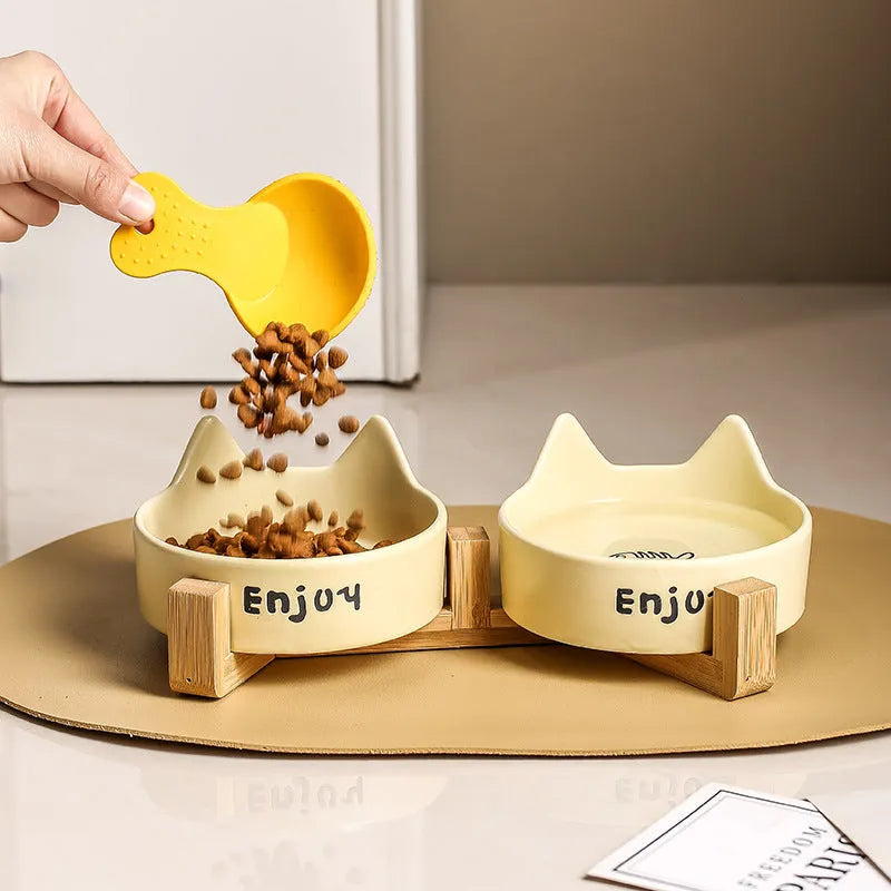 Porcelain cat bowls with wooden frame in cat ear paw design
