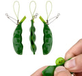 Green soft PU decompression beans toy pendant shaped like a bean pod, designed for squeezing stress relief and hanging on phone or bag