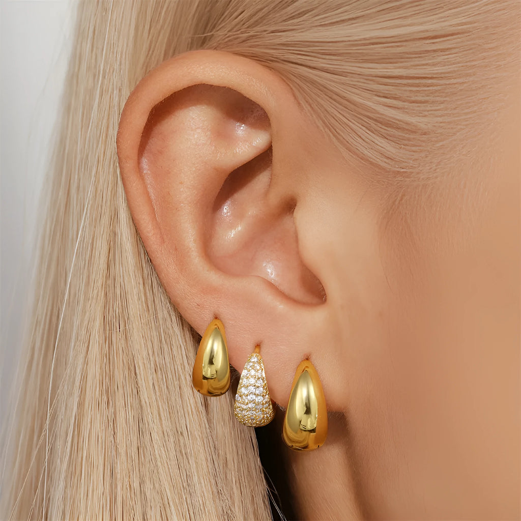 Golden brass earclip earrings with geometric round design and electroplated finish