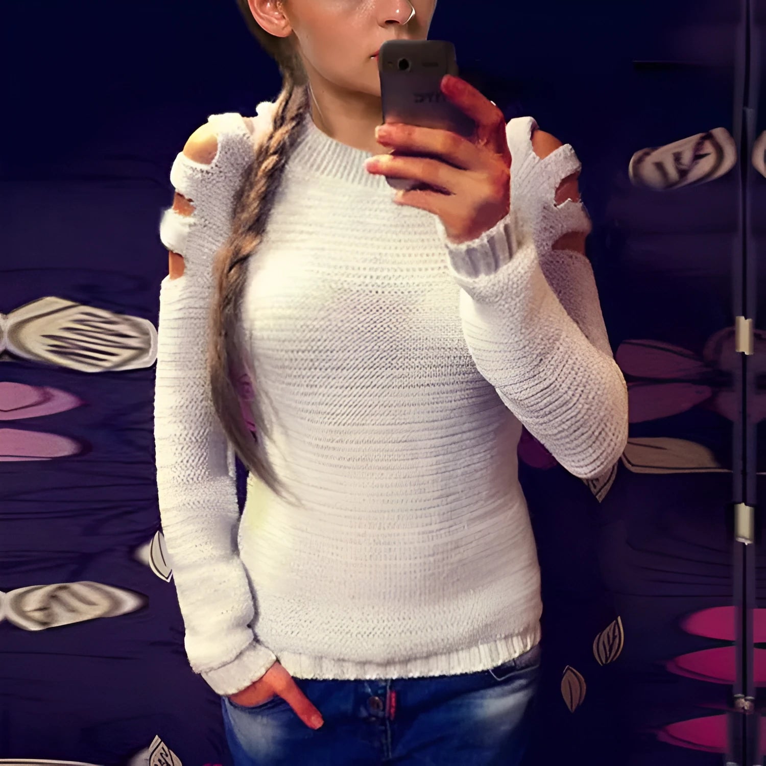 Women's white hollow-out crocheted knitted long sleeve pullover shirt.