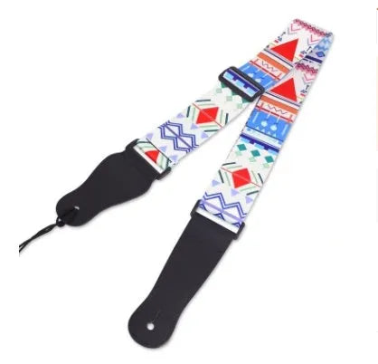 Printed cloth guitar shoulder strap showing colourful design patterns including national flag and lightning motifs