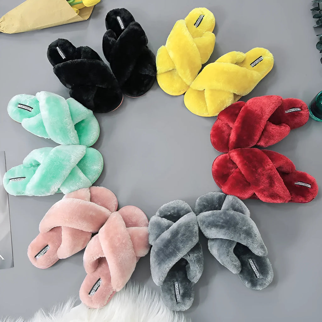 Cross open-toe fur slippers in multiple colours on a patterned non-slip sole.