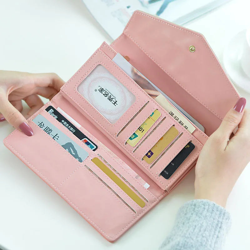Tri-fold PU leather wallet with metal buckle in black, blue, green, melon red, or violet