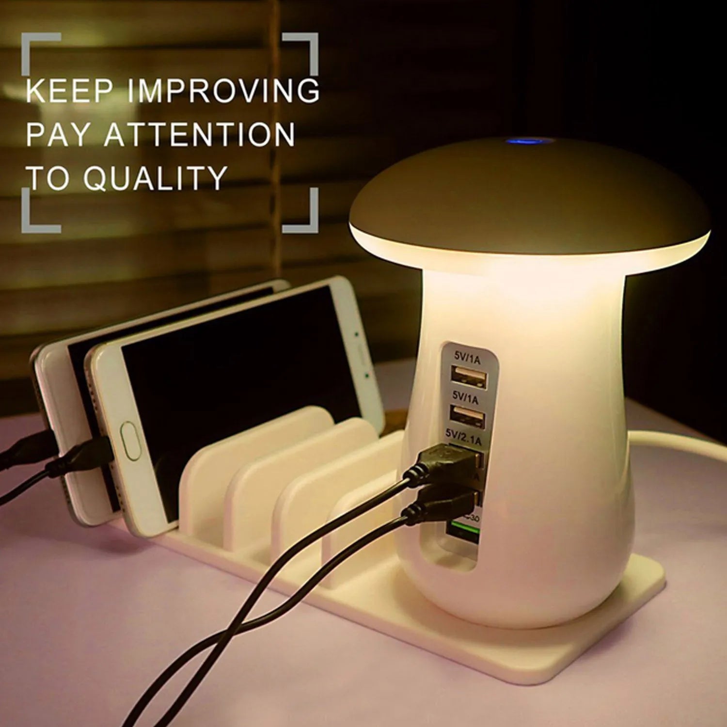 White mushroom-shaped LED light on a five-port USB charging station for phones and tablets