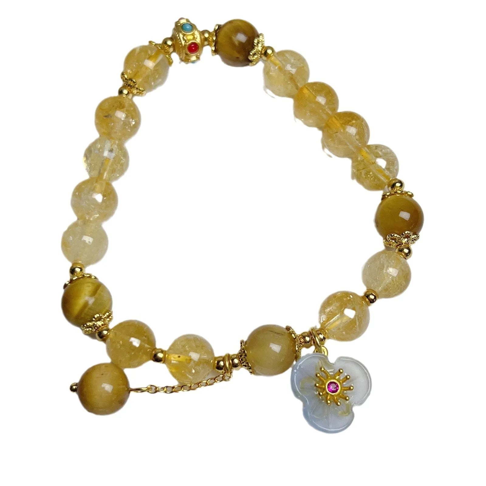 Handmade citrine colour crystal bracelet with floral and tassel detailing for women.
