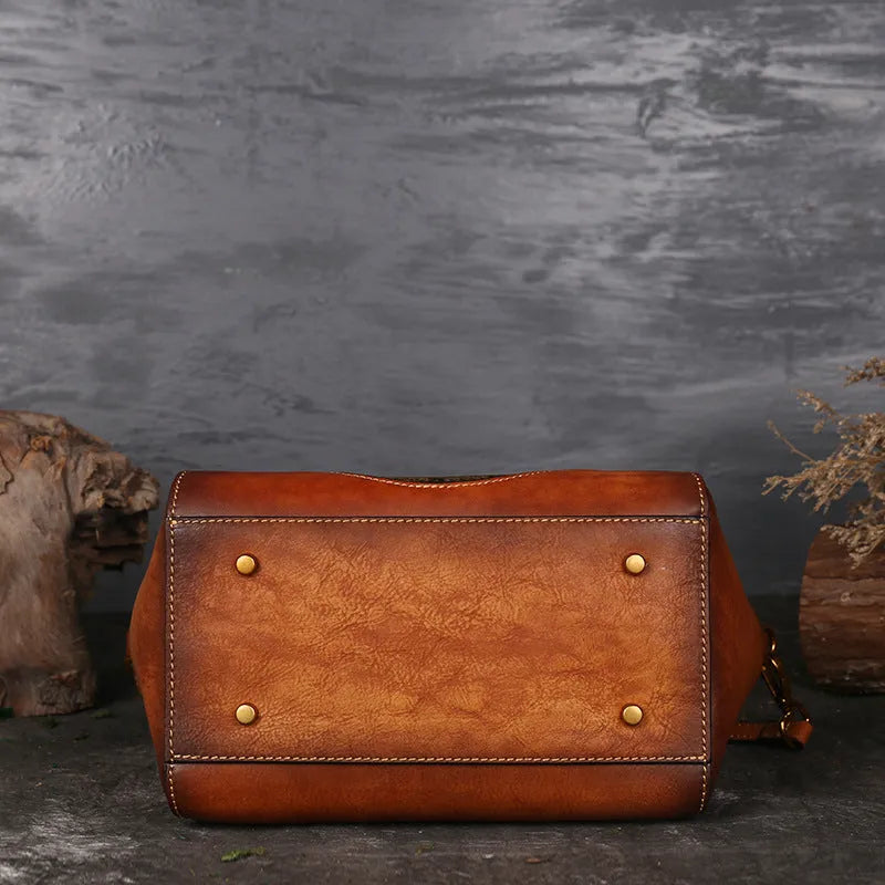Genuine embossed leather messenger top handle bag in Graphite Grey with totem pattern