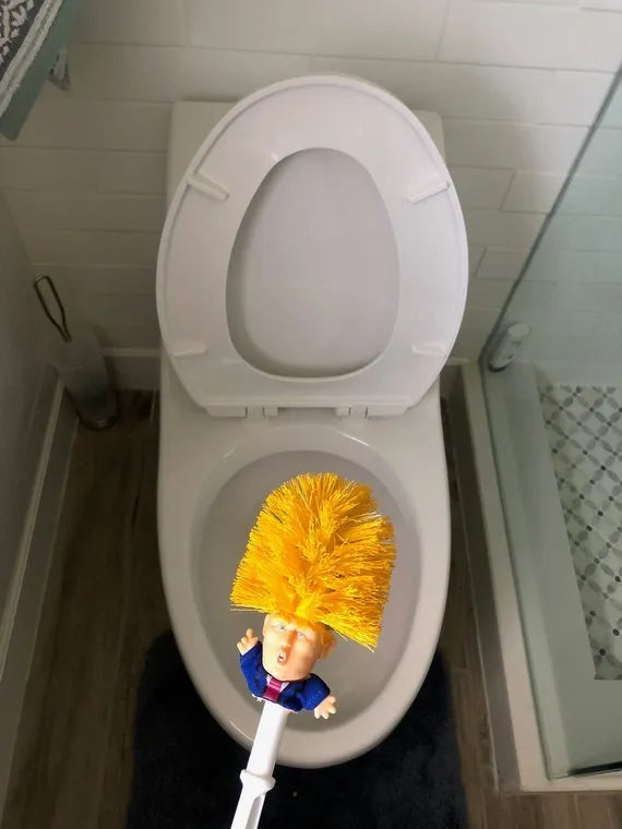 Yellow plastic Donald Trump novelty toilet brush with hanging handle, 40cm long