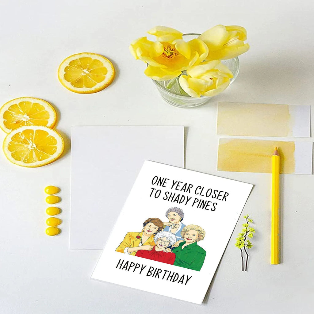 Simple modern printed birthday greeting card with a selection of coloured and Kraft paper envelopes