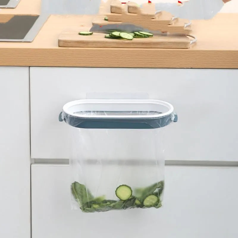 Blue or pink plastic kitchen garbage bag storage rack mounted to cabinet