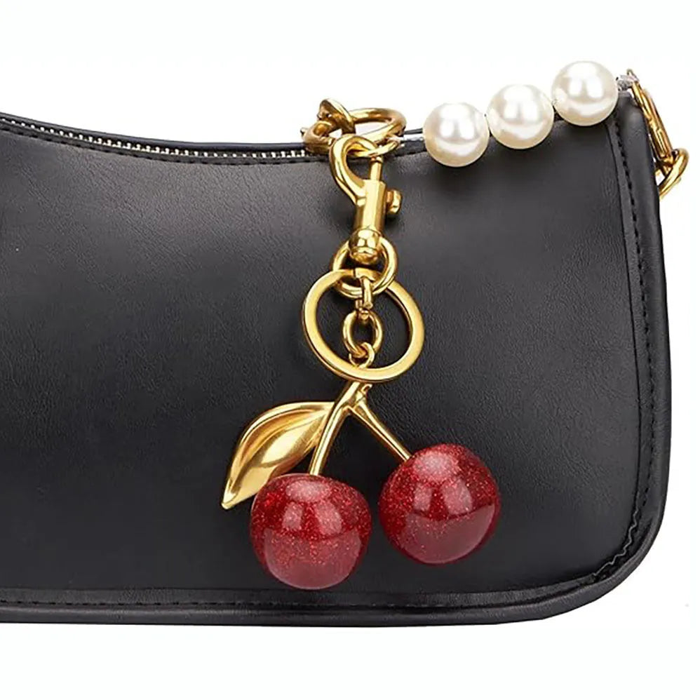 Zinc alloy three-dimensional cherry key pendant in pink or red colour options