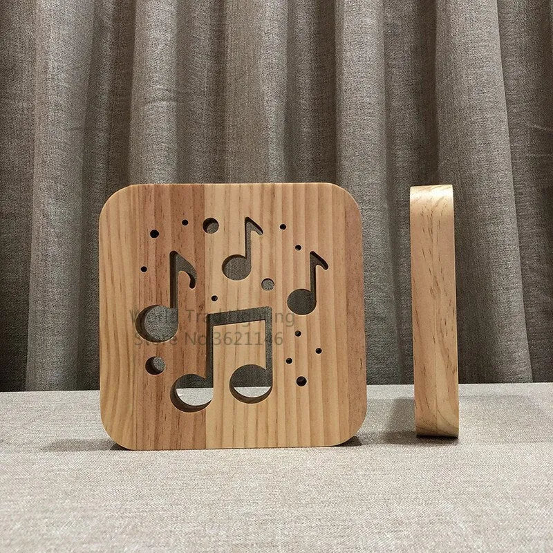 Square pine wood USB LED atmosphere lamp emitting a warm white 3D light.