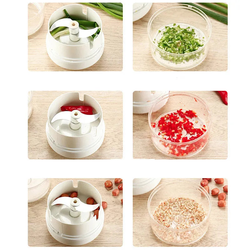 White manual food chopper with stainless steel blades on a magnet, shown with garlic and vegetables.