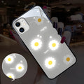Apple iPhone case with voice-activated colour light showing painted daisy floral design