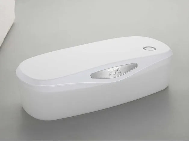 DORR portable UV sterilisation box with USB cable on a white background.