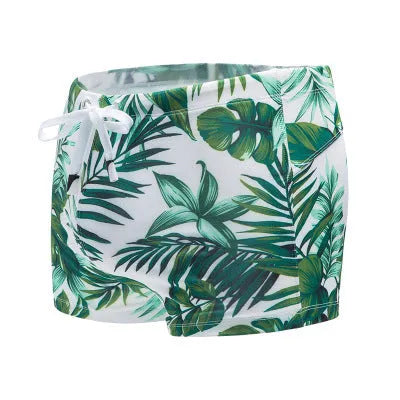 Green nylon men's boxer briefs swimwear shown flat, size L to 3XL available