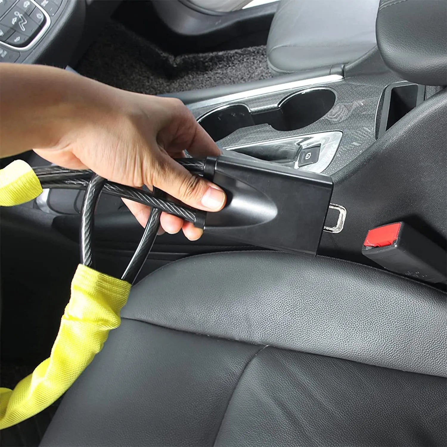 Red iron steering wheel lock for General Motors cars showing copper lock core