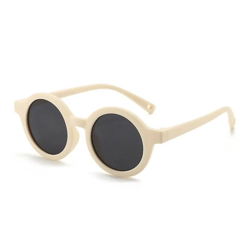 Children's silicone sunglasses with round full frame, UV400 polarised TAC lenses, and flexible TPEE construction for 0-3 year olds