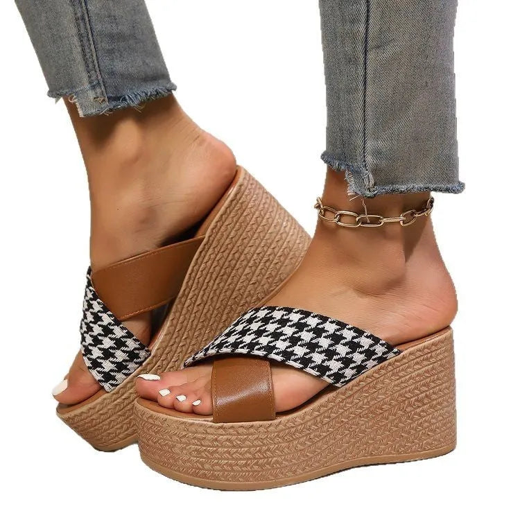 Cross leopard plaid wedge sandals in black or brown with rubber sole and plastic construction