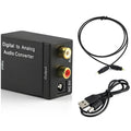 Black digital to analogue audio converter with Toslink and RCA inputs for DVD and AV systems.