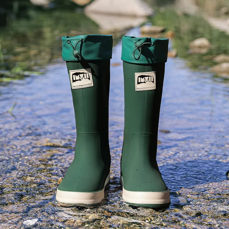 Pair of solid colour platform heel PVC wellington boots for men and women.
