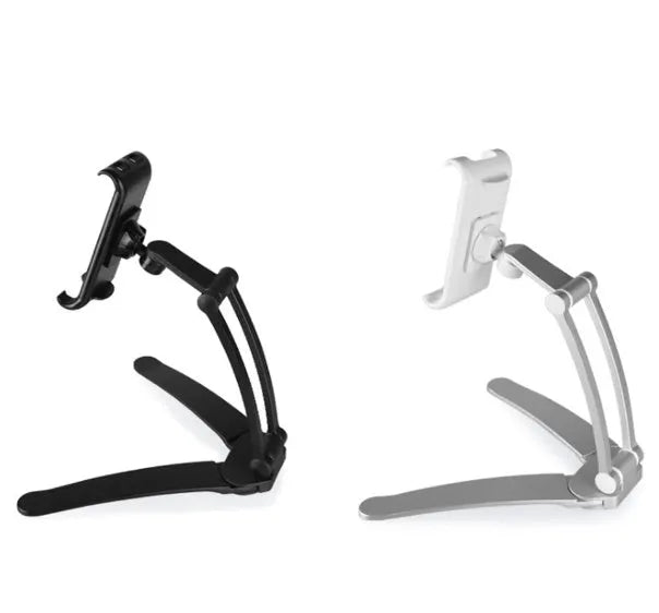 Silver aluminium alloy desktop tablet stand holding a tablet, showing 360-degree adjustable arm and mounting base.