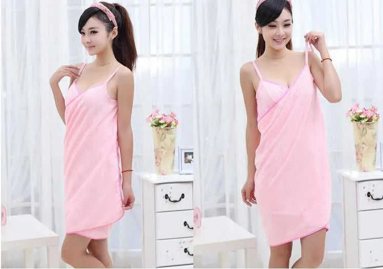 Lightweight microfiber beach towel dress shown in blue, worn as a cover-up at the beach.