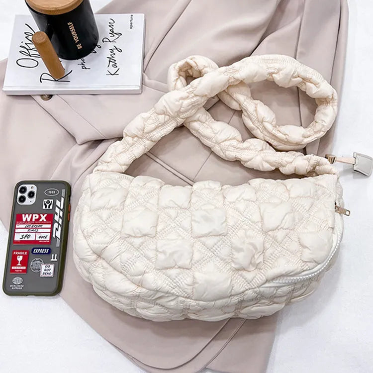Women's nylon underarm shoulder bag in beige colour showing front view with adjustable strap