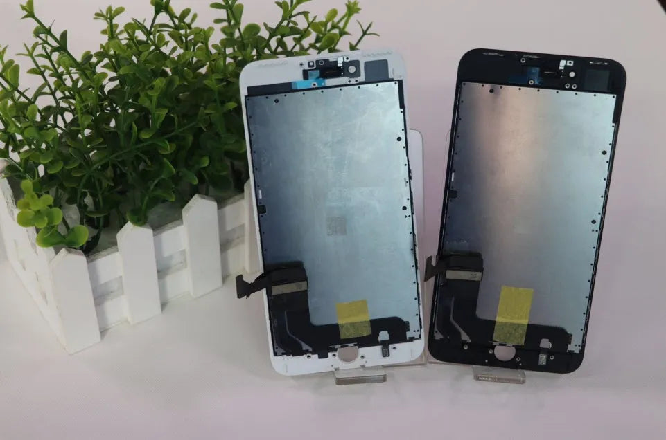 iPhone LCD touch screen replacement panel with disassembly tool and original black and white covers.